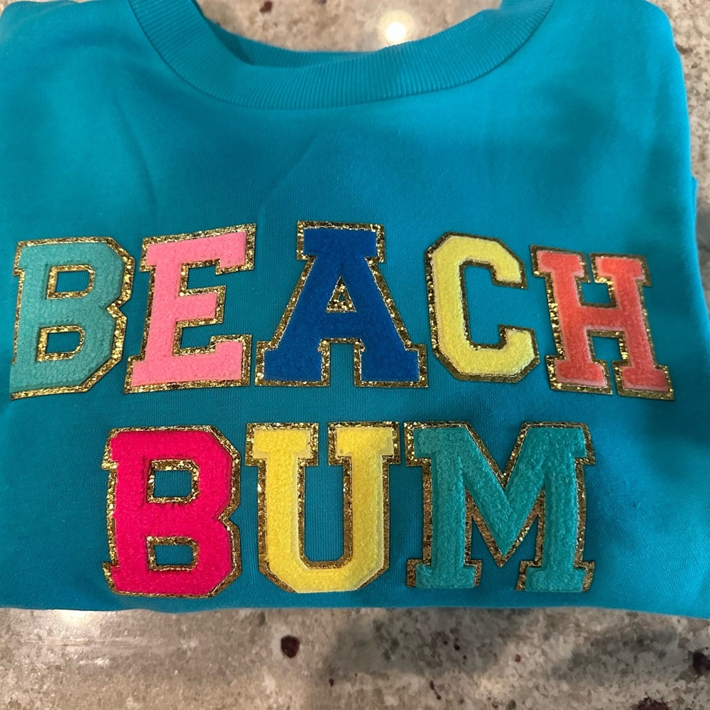 Judith March Blue Multicolor Sweatshirt “Beach Bum”. NWT